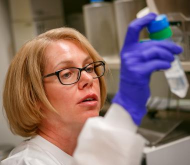 Deborah Baker performing Pulsed-field gel electrophoresis (PFGE) analysis on water samples received during the NYC South Bronx Legionella investigation. Deborah Baker performing Pulsed-field gel electrophoresis (PFGE) analysis on water samples received during the Legionella invest