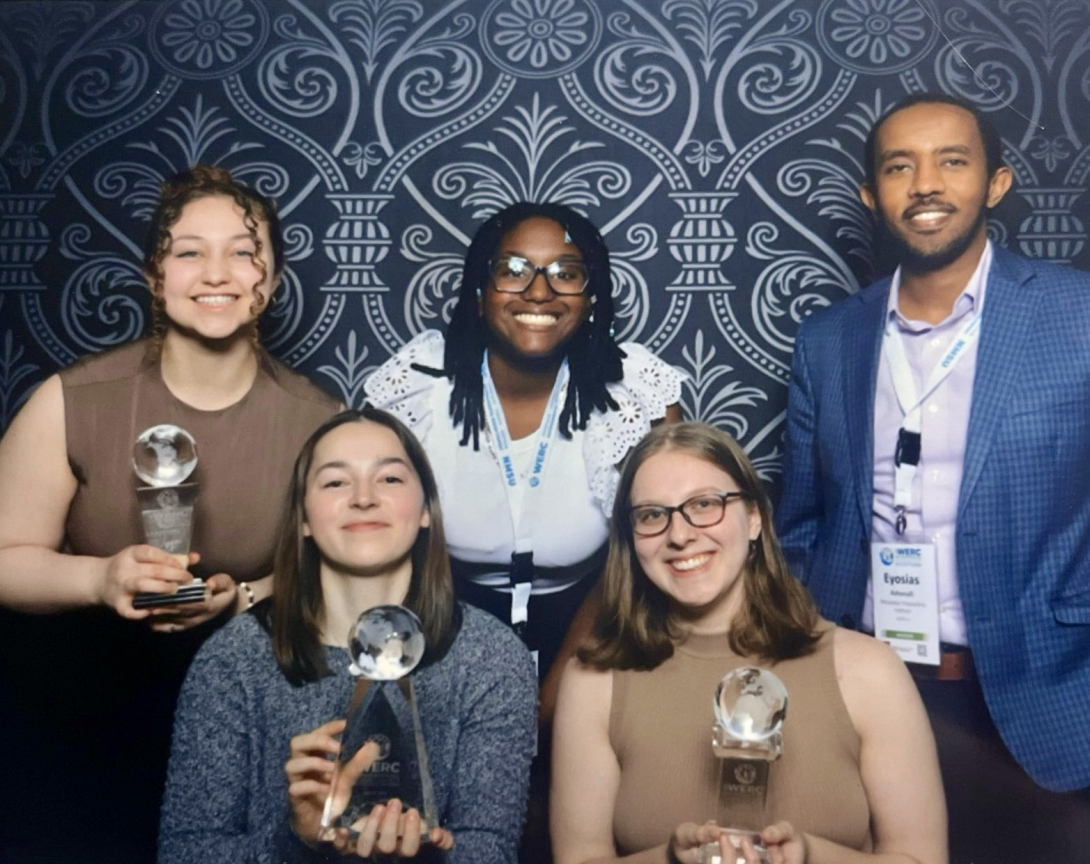 RPI students and mentor with awards won at conference